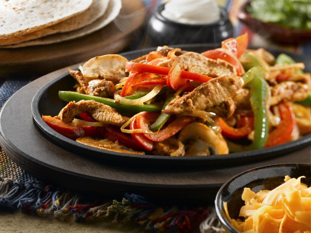 Try the fajitas at Tequila Grande, they're delicious.